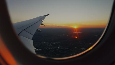 view of the sunset from a plane window