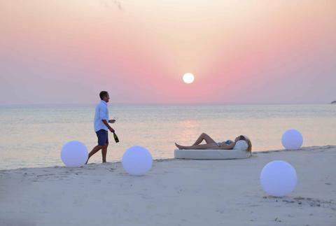 couple on the beach relaxing in mozambique